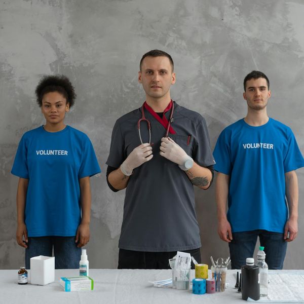 Group of diverse people smiling and supporting each other.